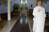Nun caring for for the church in the convent of Palestinia Reginae