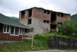Restoran Sarajevo in front of a war ruin, Međeđa