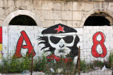 Graffiti on a walled up ruin along Mostars Main Street