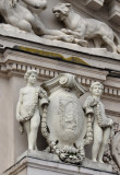 Coat of Arms of Lviv (Lemberg) flanked by sculptures of two boys