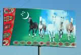 Billboard with Turkmenistan flag and 5 horses