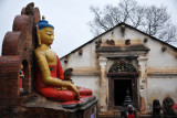 Yellow Buddha with the Shantipura Building, Swayambhunath
