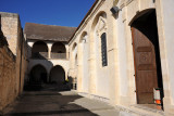 The monastery surrounds the church on three sides