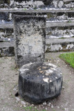 Altar and weather-beated stela on the Gran Plaza