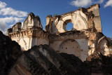 Giant blocks of rubble from the collapsed roof and fallen walls fill the churchs interior