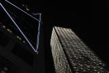 Cheung Kong Center at night with part of the Bank of China Tower
