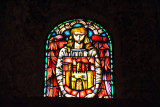 Stained glass window of an angel with a shield, Sala de las Pias