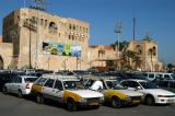 Taxis parked on Martyrs Square in front of Tripoli Castle