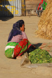 Nepali woman with some kind of vegetables