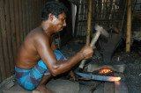 Bangladeshi blacksmith at work, Fatulla