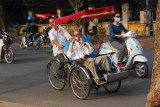 Dad getting peddled from the Temple of Literature to Ho Chi Minhs mausoleum