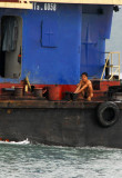 Crewman washing, Halong Bay