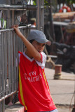 Vietnamese boy with a Fly Emirates shirt, Halong City