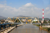 Bridge across a river in an industrial town near Halong City