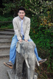 Jeng riding an elephant