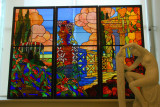 Stained glass windows with a statue of a woman dressing, National Art Museum of Catalonia