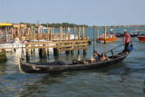 Venetian gondola padding up to the Molo