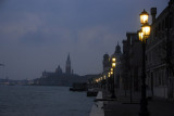San Giorgio Maggiore at first light with the street lamps along Fondamenta Zitelle on Giudecca still illuminated
