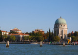 Lidos Votive Temple of Santa Maria Elisabetta (1925) is the most striking feature as the ferry arrives