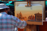 Sidewalk painter at work in Venice