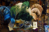 Feathered half-masks for Carnival, preferred since its easy to eat and drink