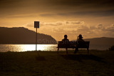 Couple on bench at Pittwater