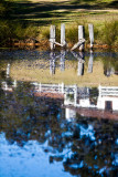 Reflection of Oaks Ranch in dam