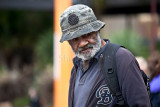 Man in hat at Quay