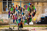 Thongs on fence in Manly