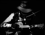 Country and western guitarist in monochrome