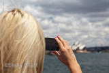 Female tourist on Sydney Harbour