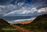 Warriewood storm with rainbow over Pacific Ocean