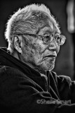 Elderly Asian man at Quay 