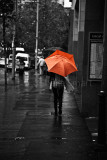 Orange umbrella on a wintry day