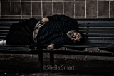 Sleeping man on bench