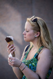 Young woman eating ice cream 