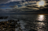 Sun, Clouds and the Sea