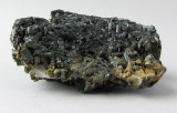 Ludwigite with etched Calcite
