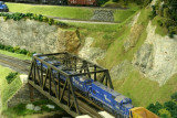 Helicopter shot of train on bridge