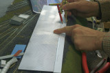 Using a compass to accurately mark the loading door locations