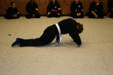 When Sensei hits with simultaed shuriken (blue disk) there is a penatly (pushups!)