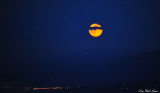 full moon rising on evening of 4th July, Seattle, Washington