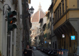 A glimpse of the Duomo looking along Via dellOriolo