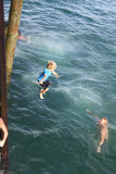 Zach, aged 6, jumping off the wharf
