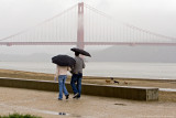 Couple at a Rainy Golden Gate