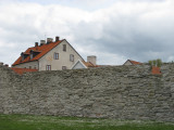 Behind the wall