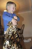 Simon puts on his tiger suit