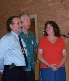 Jerry Gieseke calls Randy and Linda to the front of the church.