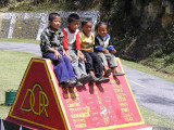 Local kids love being photographed, near Shemgang, Bhutan