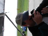 Chirs with a camera at his face...
